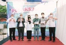 Pelaksanaan Serentak Pembayaran Retribusi Pasar Secara non Tunai di pasar binaan Pemerintah Daerah Kabupaten Mojokerto