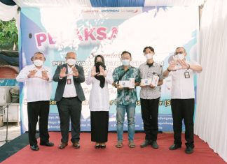 Pelaksanaan Serentak Pembayaran Retribusi Pasar Secara non Tunai di pasar binaan Pemerintah Daerah Kabupaten Mojokerto